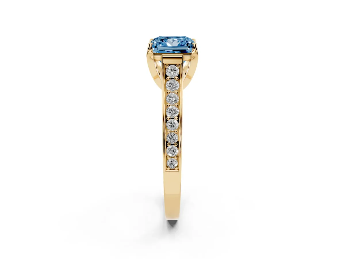Fancy Blue Princess Cut Brilliant Cut Diamond Engagement Ring with Pavé Band and Four-Prong Setting Yellow gold
