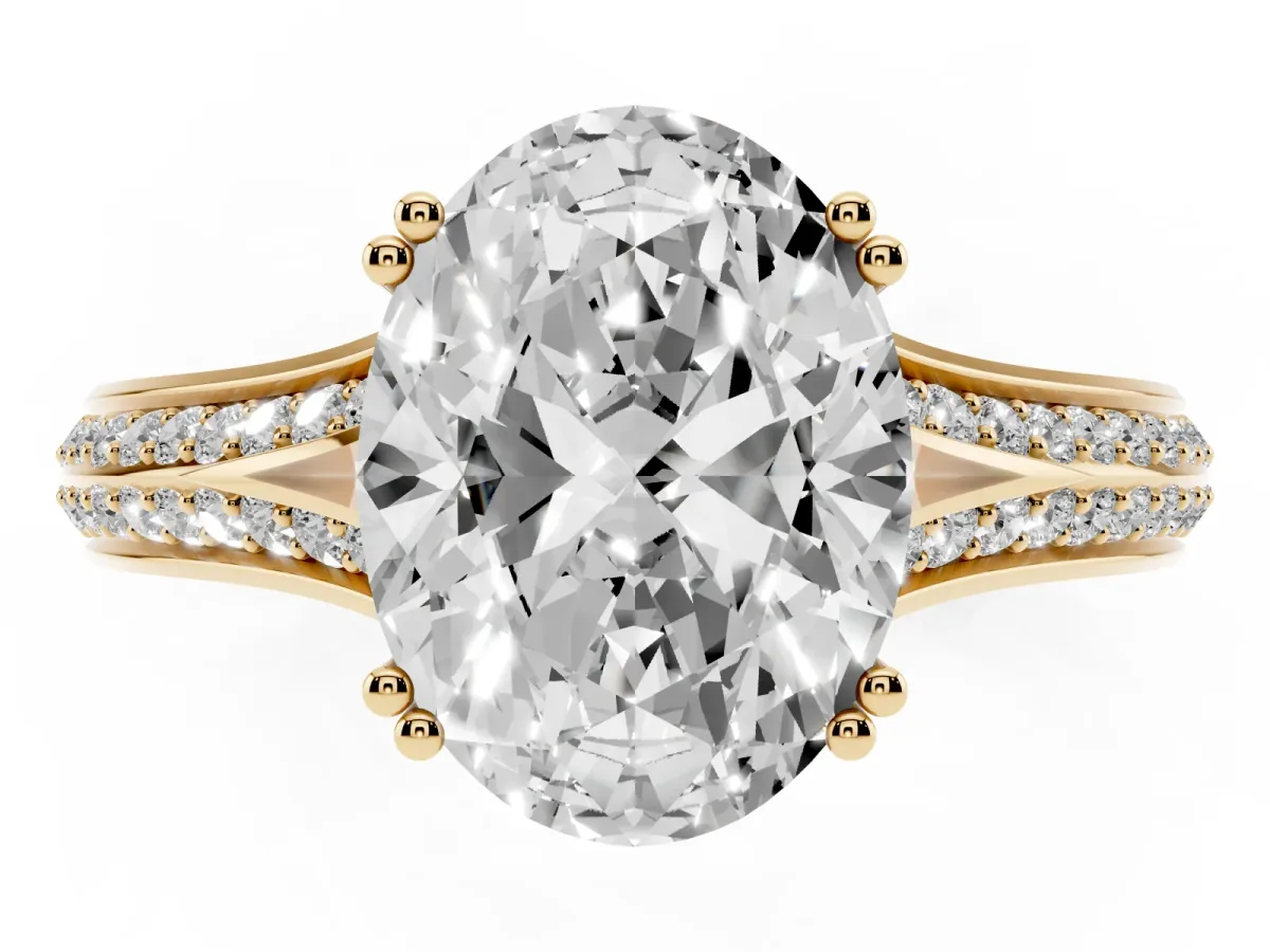 Oval Cut Diamond Split Shank Engagement Ring with Pavé Band Yellow gold