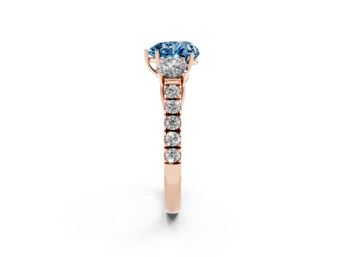 Fancy Blue Heart Cut Cut Diamond Three-Stone Ring with Round Side Stones and Pavé Band Rose gold