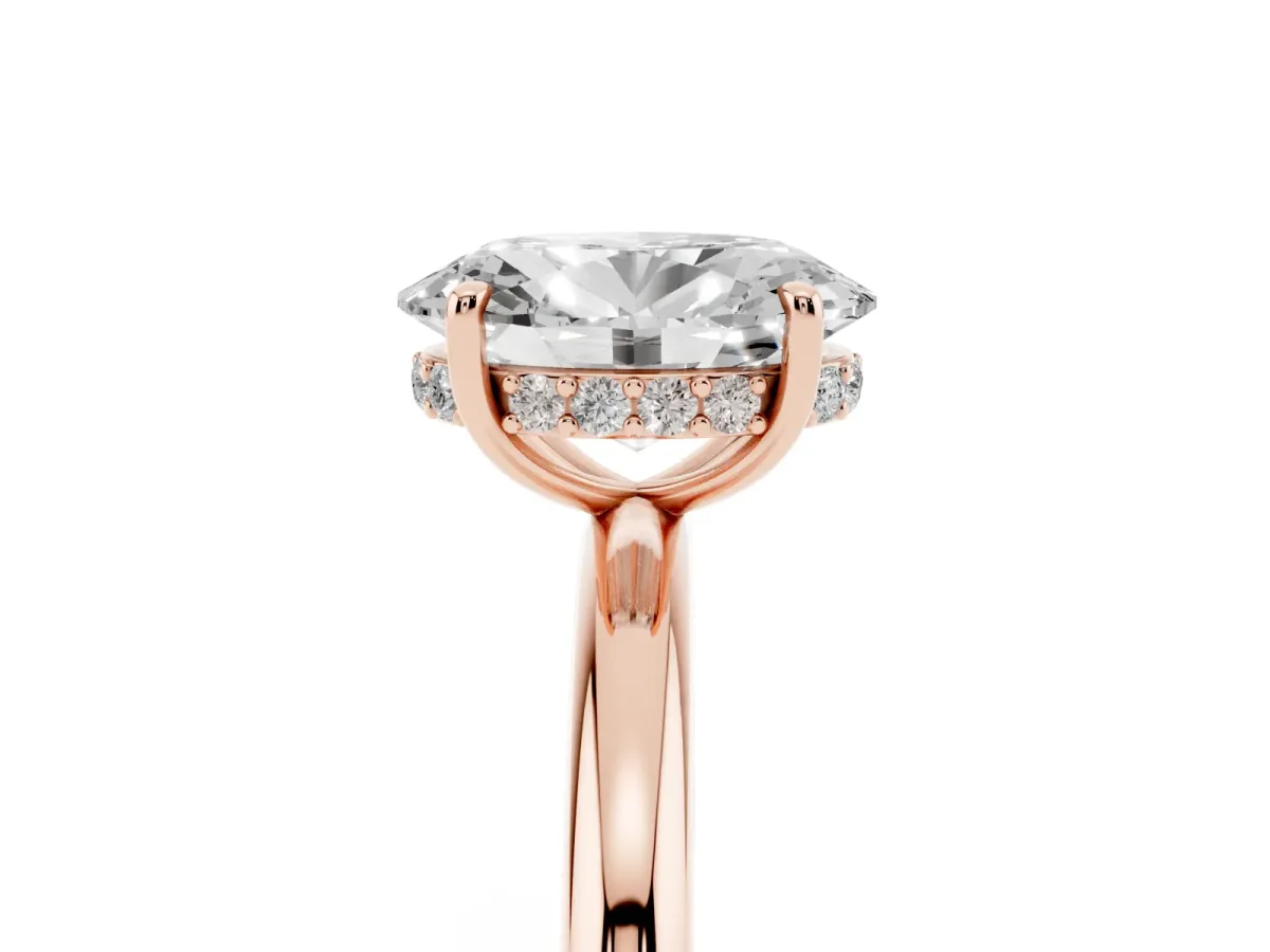 Oval Cut Diamond Solitaire Ring with Thin Band and Four-Prong Setting Rose gold