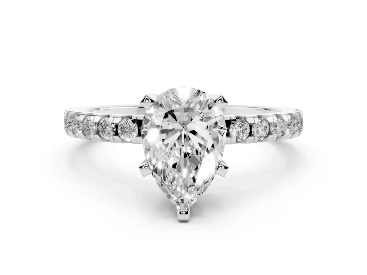Pear Cut Diamond Solitaire Ring with Round Pavé Band and Four-Prong Setting Silver