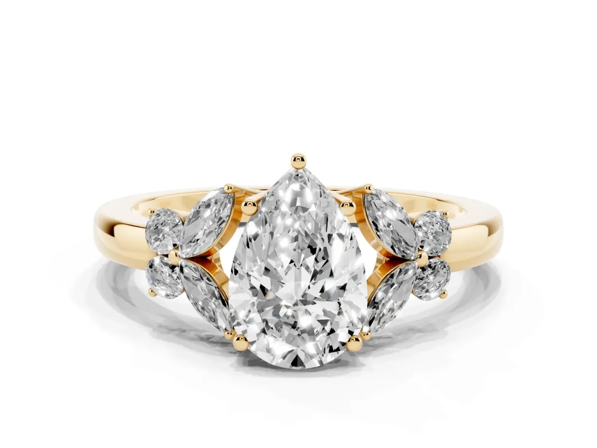Pear Cut Cut Solitaire Floral Diamond Ring with Four-Prong Setting Yellow gold