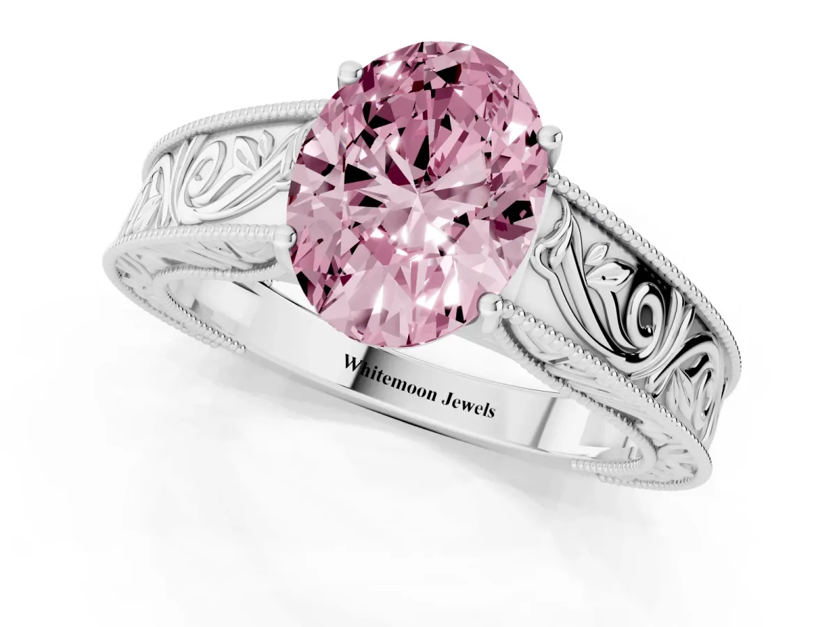 Fancy Pink Oval Cut Diamond Solitaire Ring with Engraved Band and Four-Prong Setting Silver