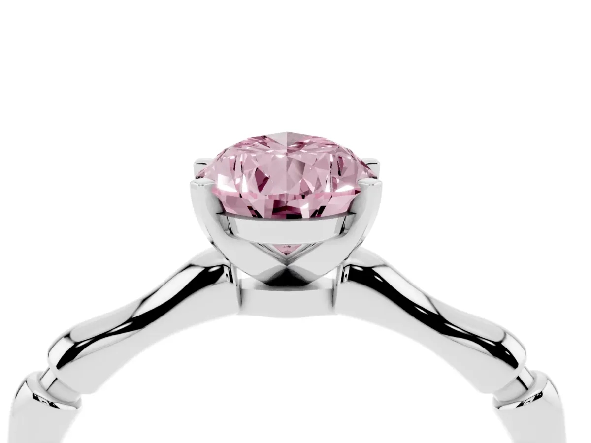 Fancy Pink Pear Cut Solitaire Diamond Ring with Bamboo Band and Four-Prong Setting Platinum