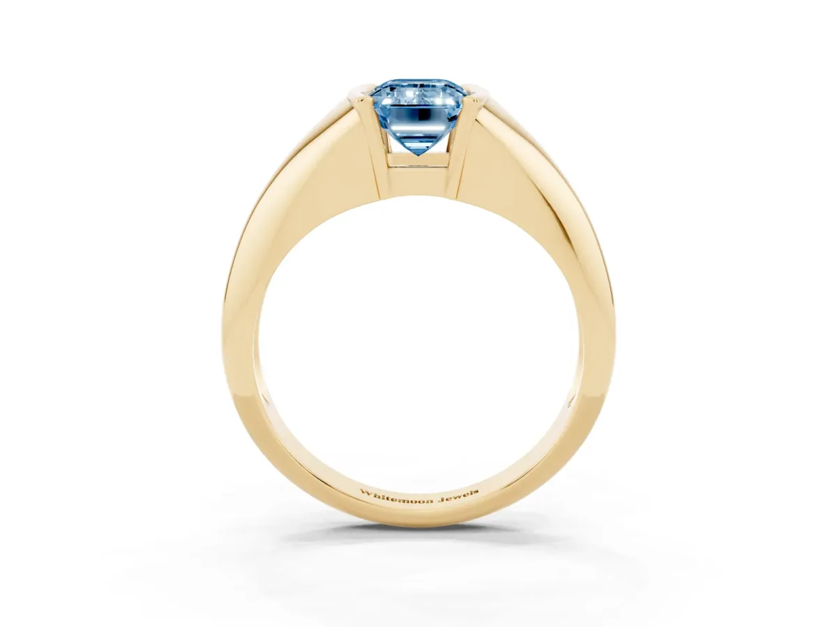 Fancy Blue Emerald Cut Solitaire Tension Set Diamond Ring Yellow gold