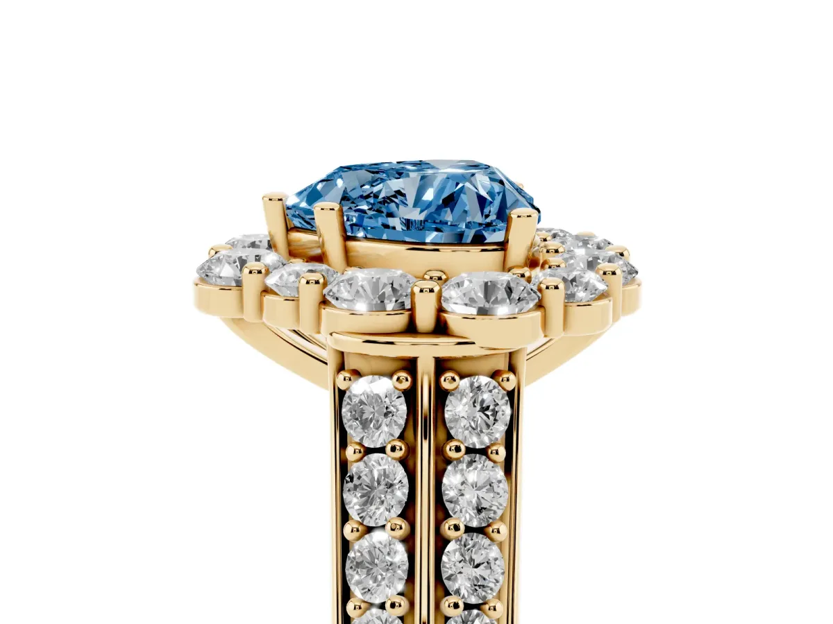 Fancy Blue Heart Cut Halo Diamond Engagement Ring with Split Shank and Prong Setting Yellow gold