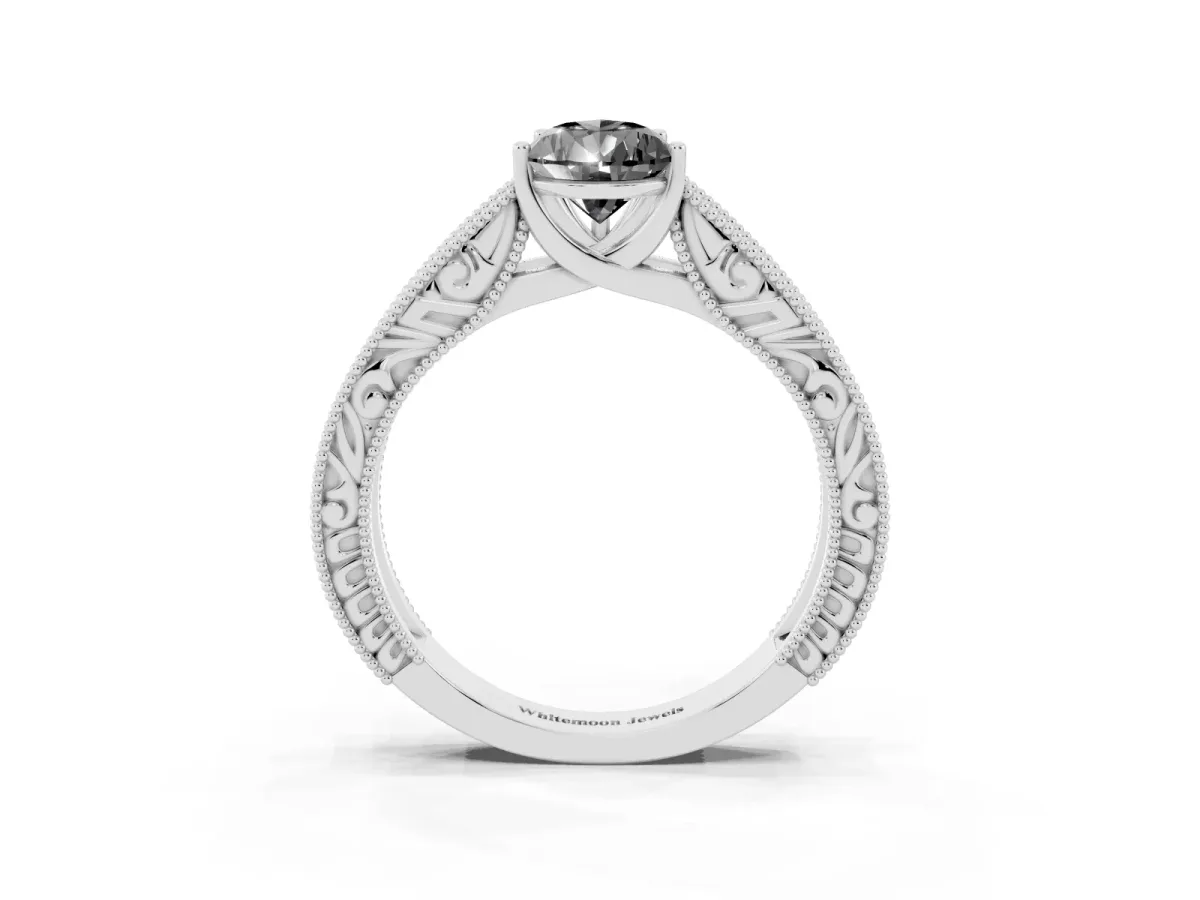Fancy Black Pear Cut Diamond Solitaire Ring with Engraved Band and Four-Prong Setting Platinum