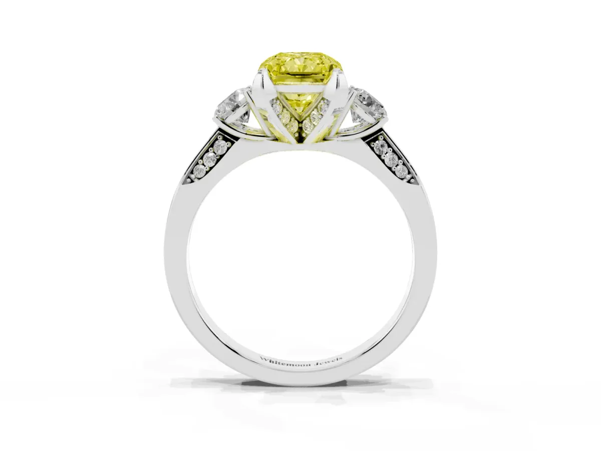 Fancy Yellow Radiant Cut Brilliant Three-Stone Diamond Ring with Pavé Band and Four-Prong Setting White gold