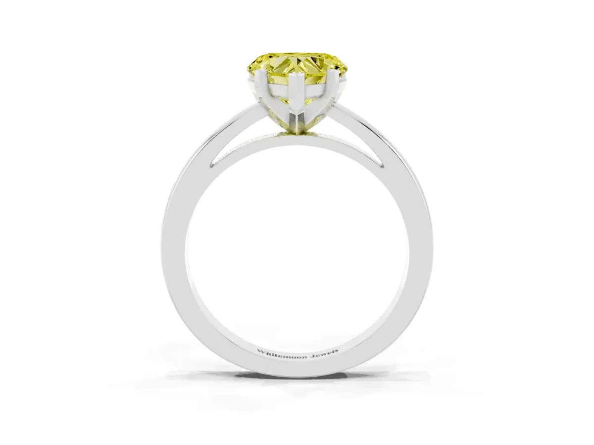 Fancy Yellow Heart Cut Solitaire Diamond Engagement Ring with Four-Prong Setting on a Classic Band Platinum