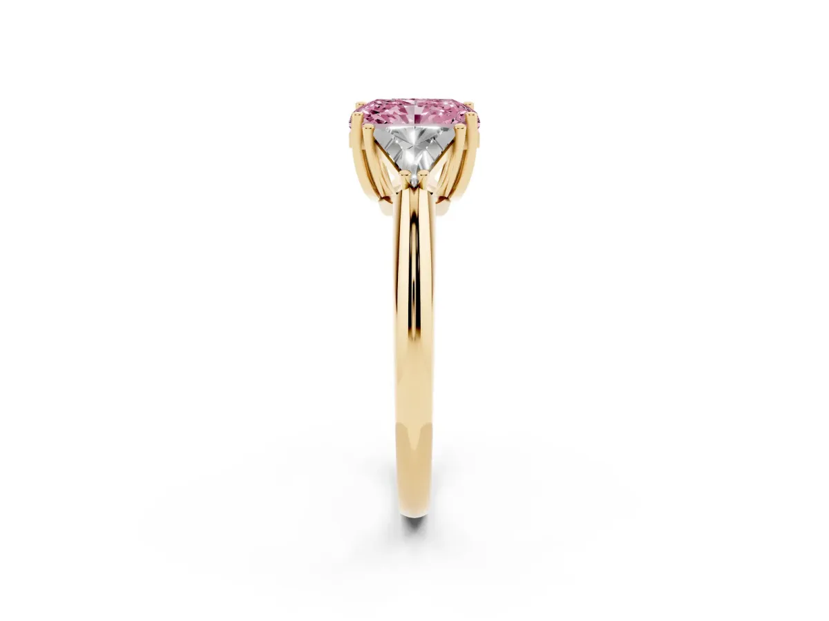 Fancy Pink Three-Stone Radiant Cut Diamond Engagement Ring with Trillion Side Stones and Prong Setting Yellow gold