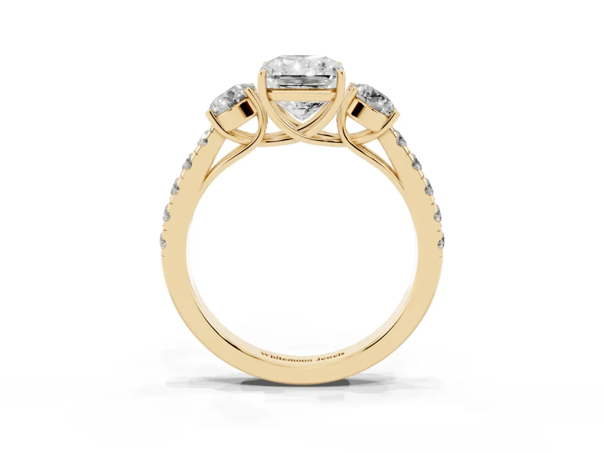 Radiant Cut Cut Diamond Three-Stone Ring with Round Side Stones and Pavé Band Yellow gold