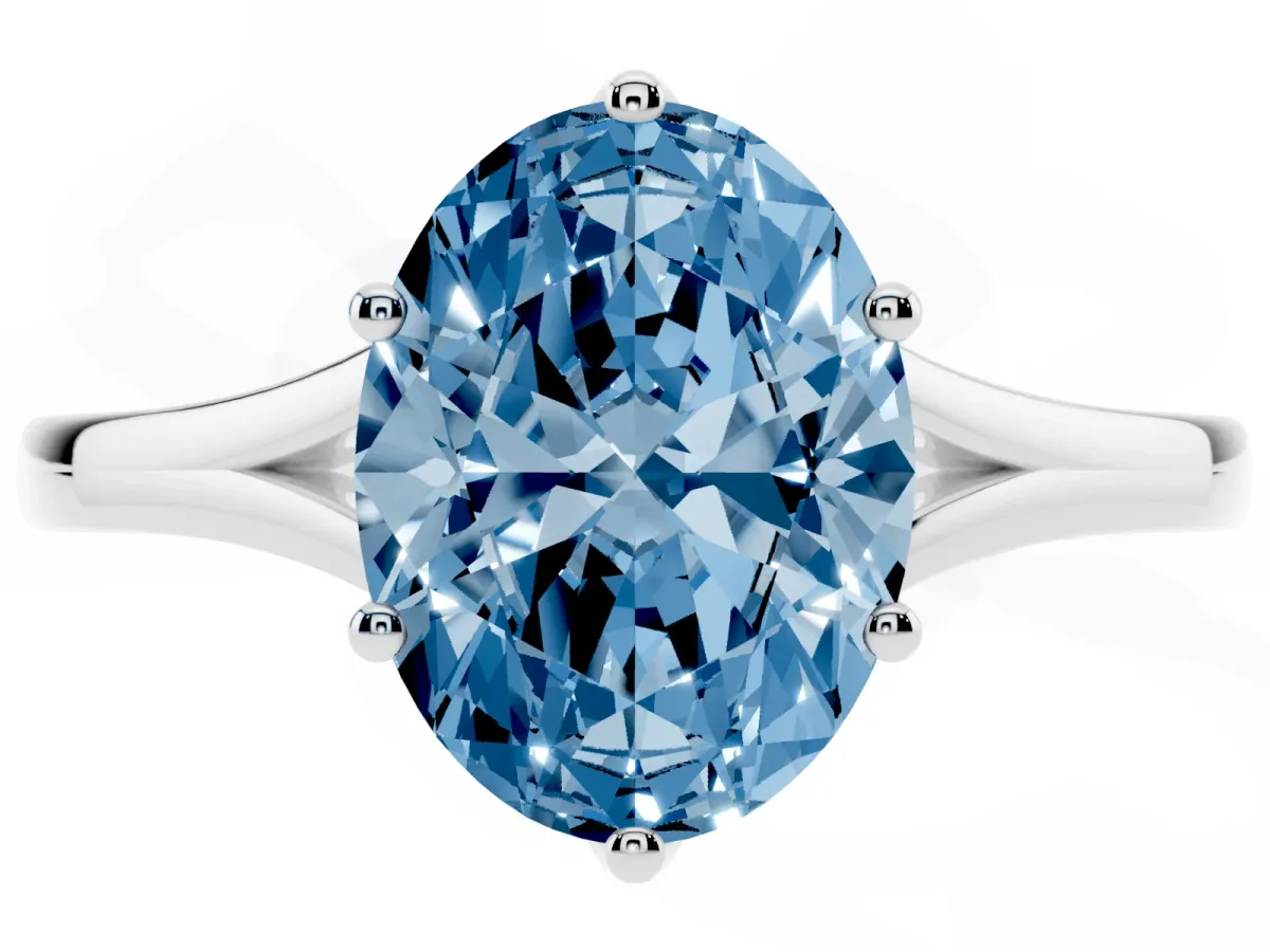 Fancy Blue Oval Cut Solitaire Diamond Ring with Six-Prong Setting and Tapered Band Silver