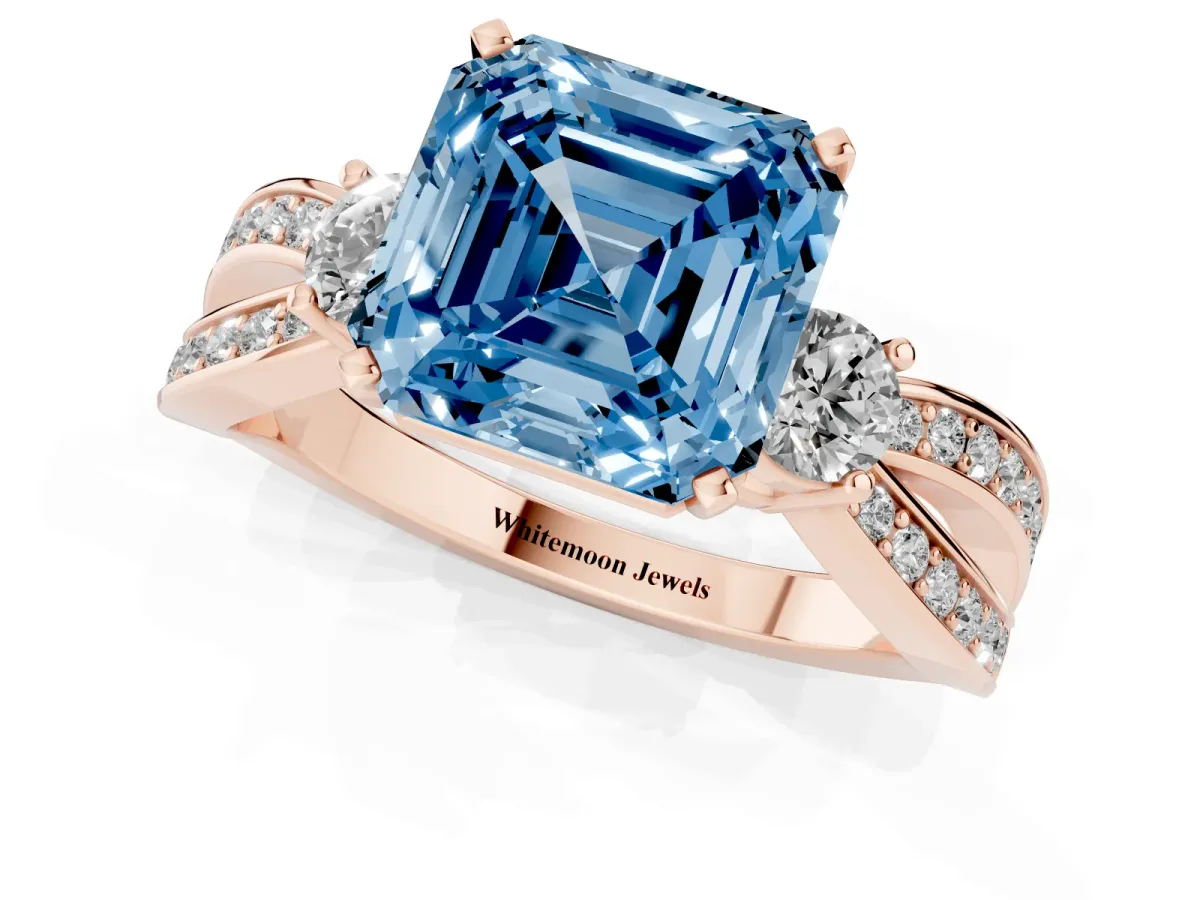 Fancy Blue Three-Stone Asscher Cut Cut Diamond Twist Band with Prong Setting Rose gold