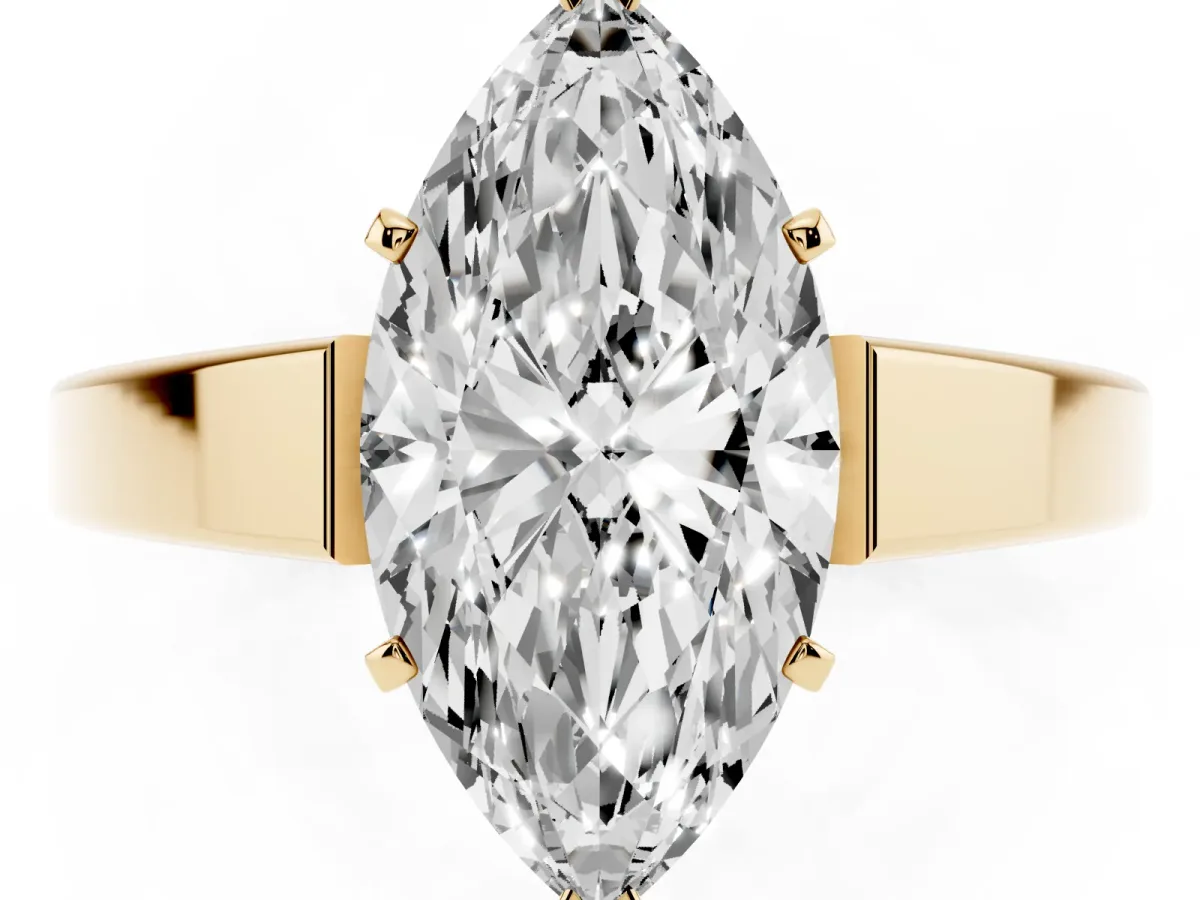 Marquise Cut Solitaire Engagement Ring with Four-Prong Setting and Tapered Band Yellow gold