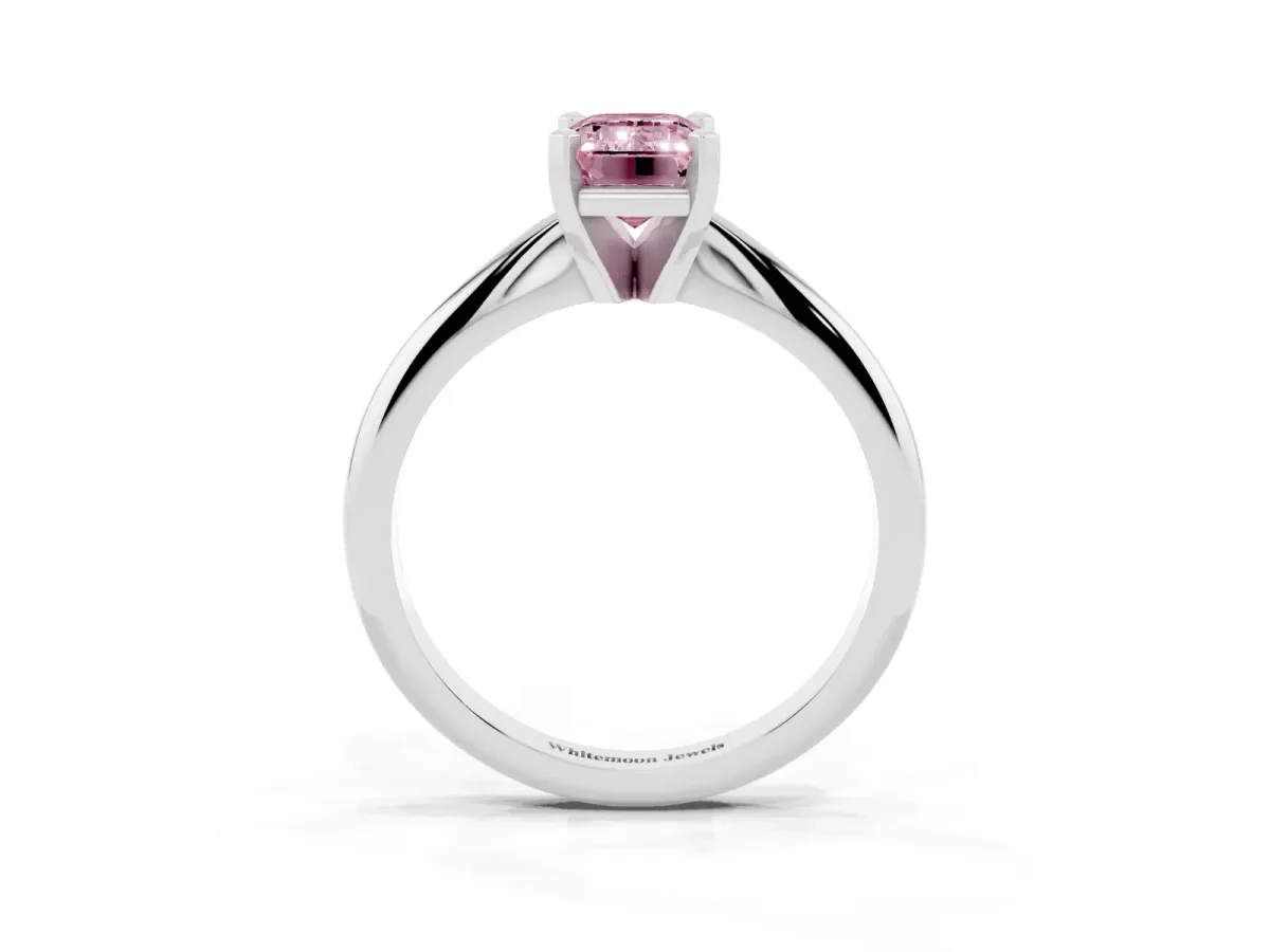 Fancy Pink Emerald Cut Cut Solitaire Ring with Four-Prong Setting on a Classic Band Platinum