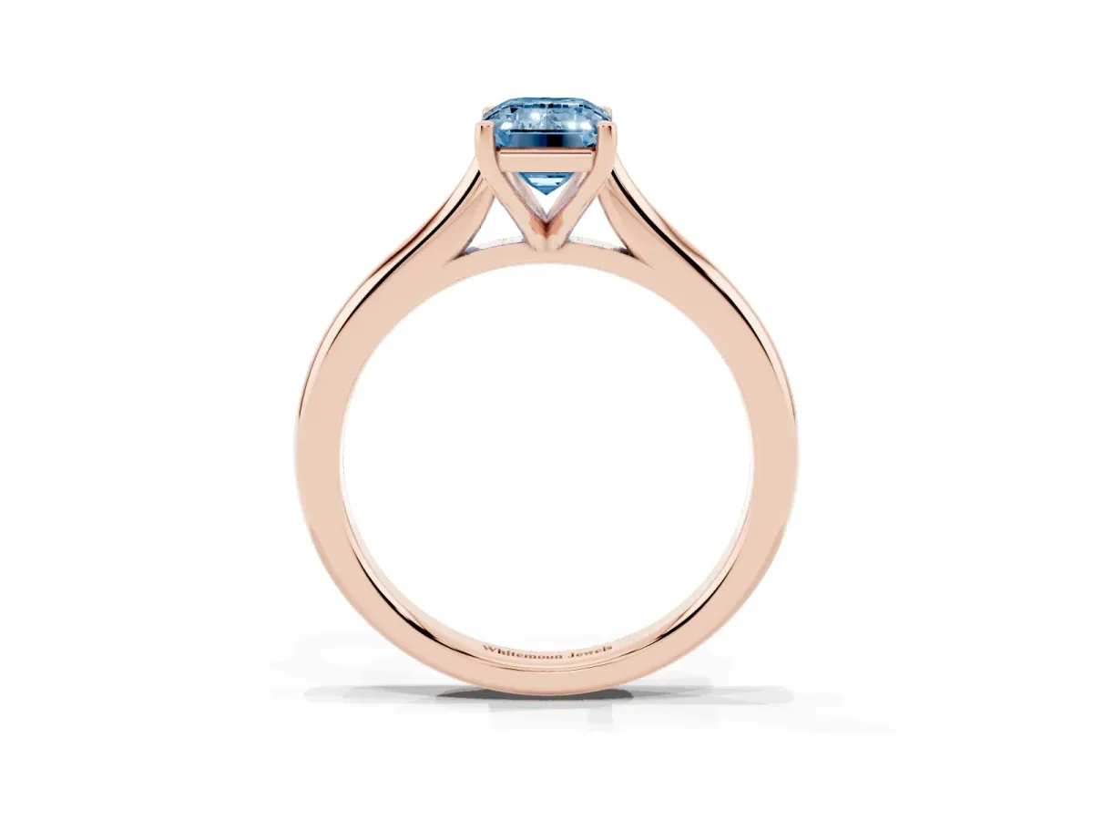 Fancy Blue Emerald Cut Cut Solitaire Ring with Cathedral Band and Four-Prong Setting Rose gold