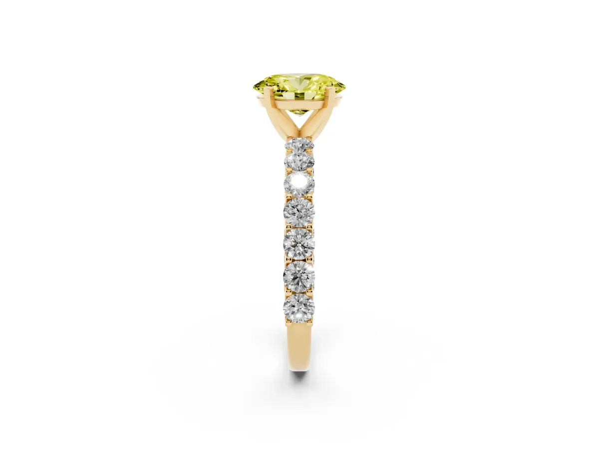 Fancy Yellow Oval Cut Diamond Solitaire Ring with Shared Prong Pavé Band and Four-Prong Setting Yellow gold