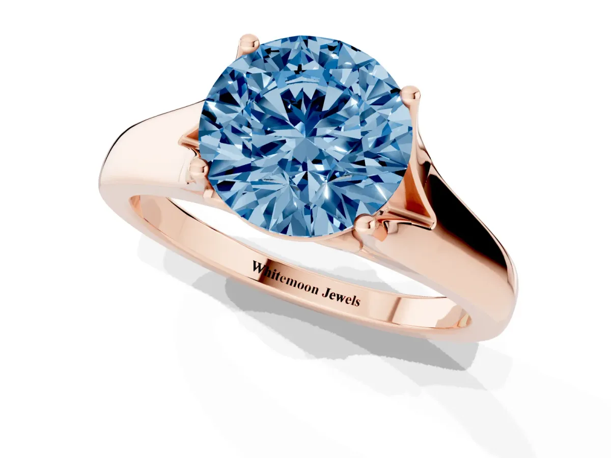 Fancy Blue Round Cut Solitaire Diamond Ring with Cathedral Band and Four-Prong Setting Rose gold