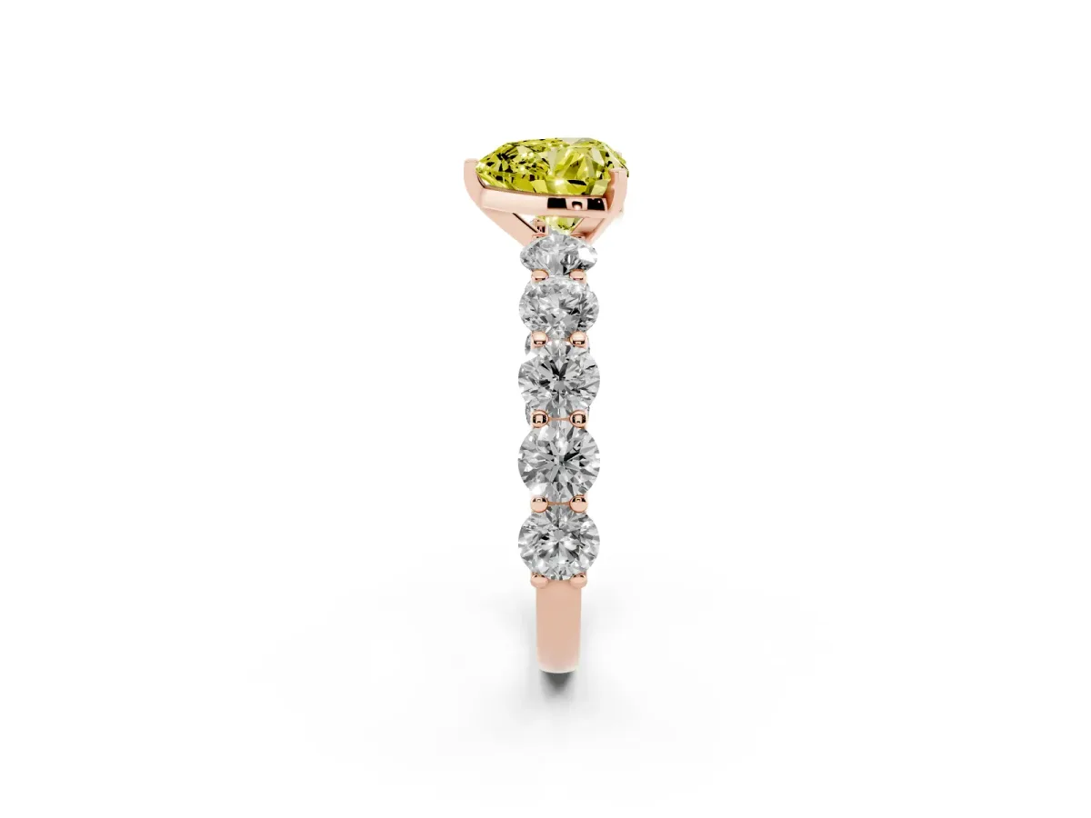 Fancy Yellow Heart Cut Diamond Prong Setting with Side Stones on a Pave Band Rose gold