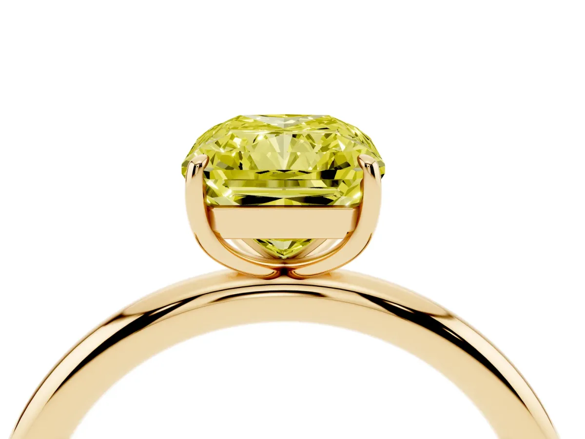 Fancy Yellow Radiant Cut Solitaire Diamond Ring with Four-Prong Setting on a Plain Band Yellow gold