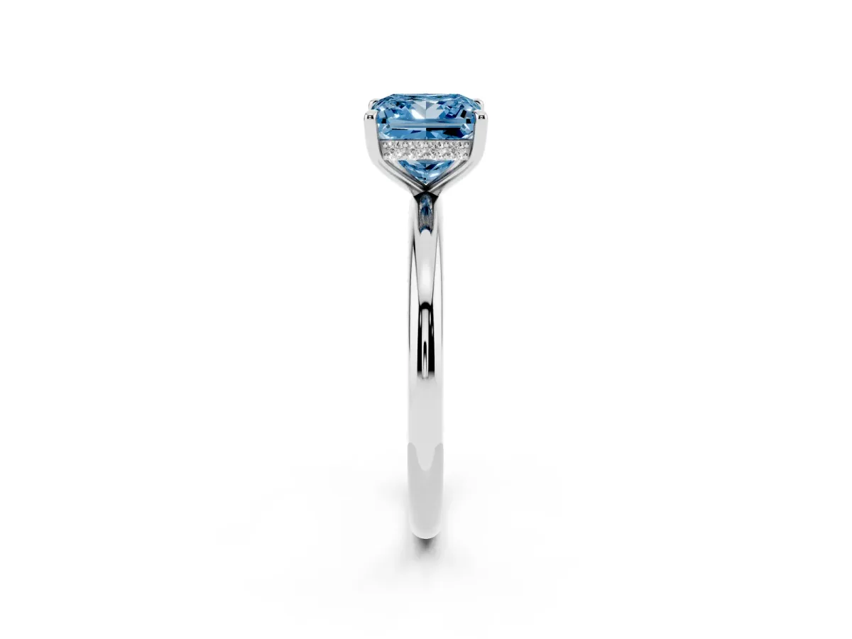 Fancy Blue Princess Cut Diamond Solitaire Ring with Thin Band and Four-Prong Setting Platinum