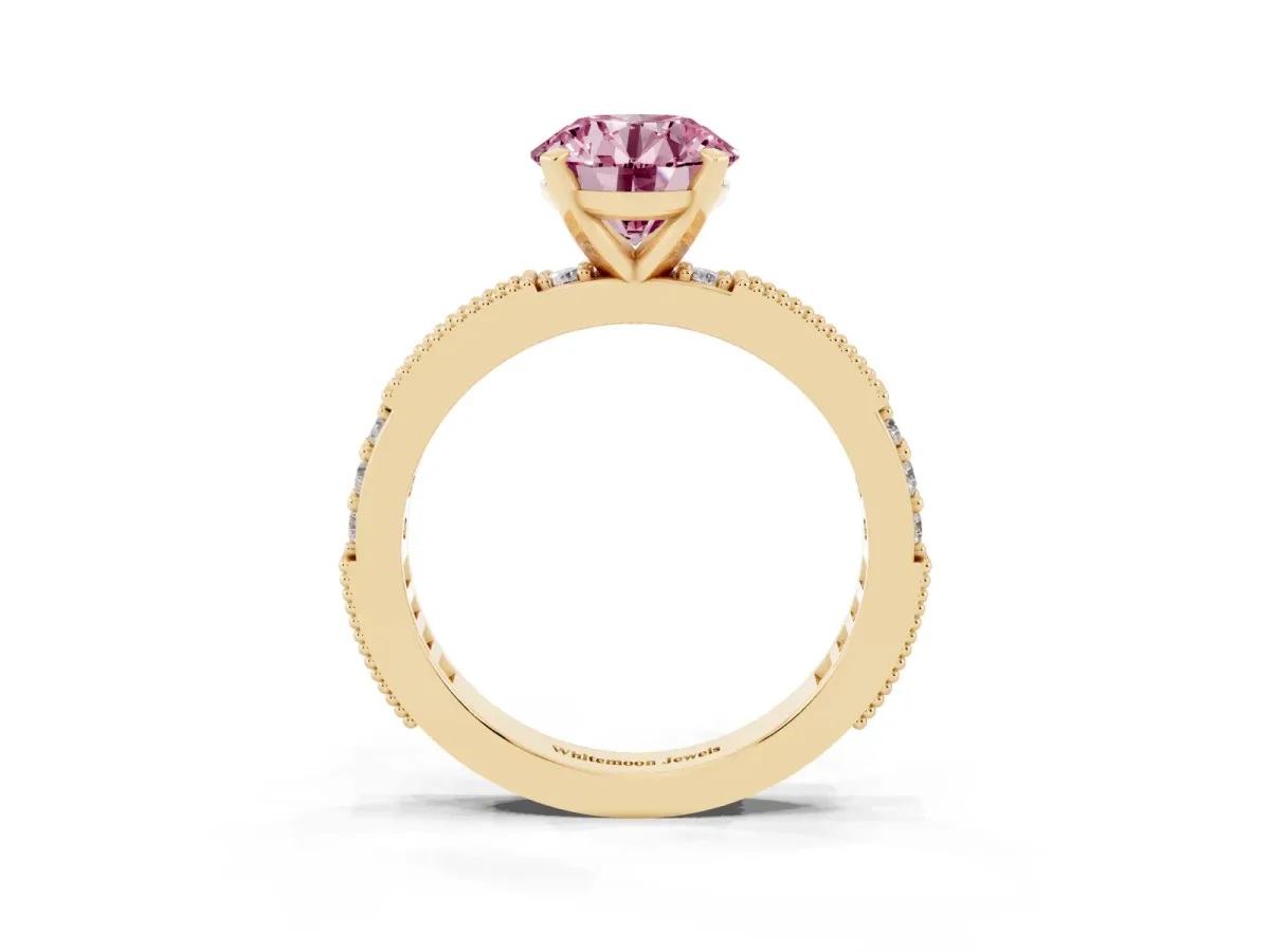 Fancy Pink Round Cut Solitaire with Pavé Band and Four-Prong Setting Yellow gold