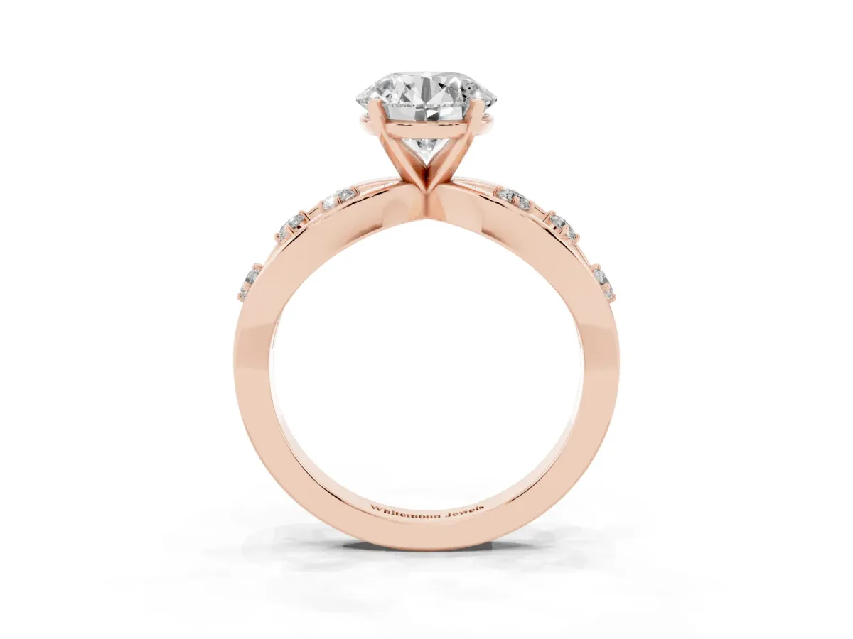 Round Cut Cut Solitaire Diamond with Side Stones on Criss-Cross Band and Four-Prong Setting Rose gold