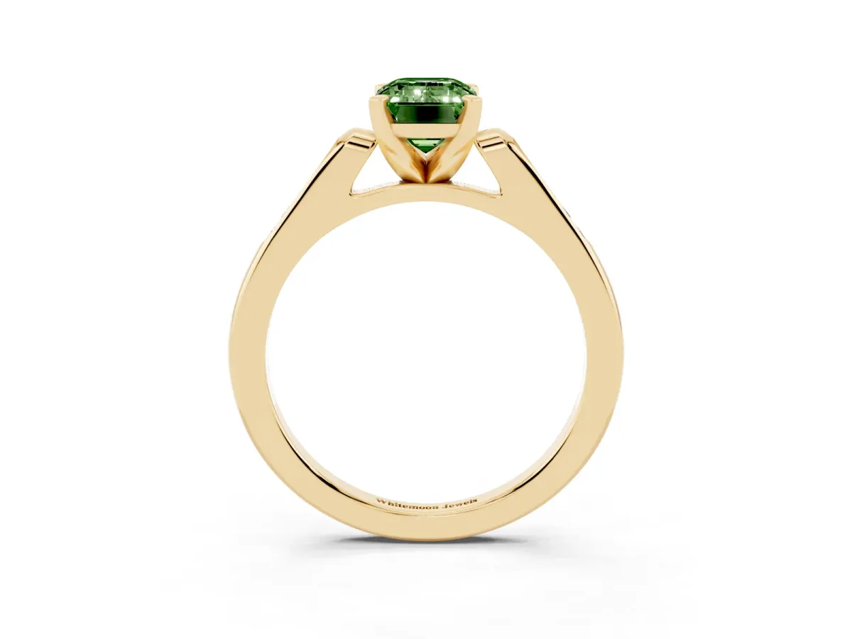 Fancy Green Emerald Cut Diamond Solitaire Ring with Channel Set Round Band and Prong Setting Yellow gold