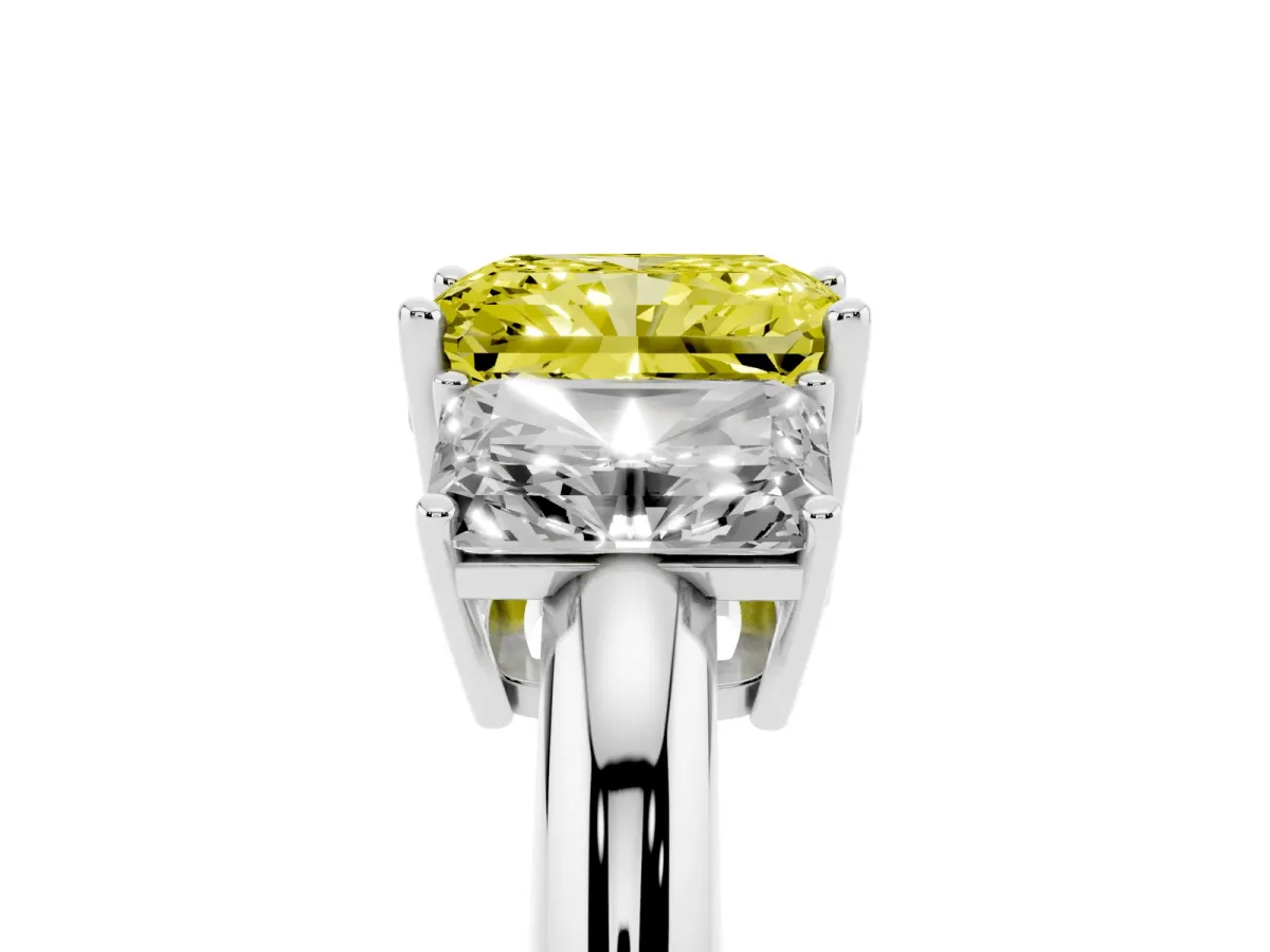Fancy Yellow Three-Stone Radiant Cut Cut Diamond Engagement Ring with Prong Setting on a White Gold Band White gold