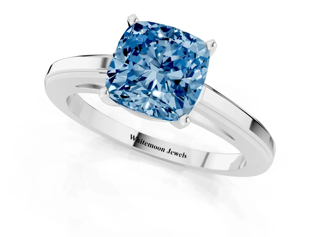 Fancy Blue Cushion Cut Solitaire Diamond Ring with Four-Prong Setting and Classic Band Platinum