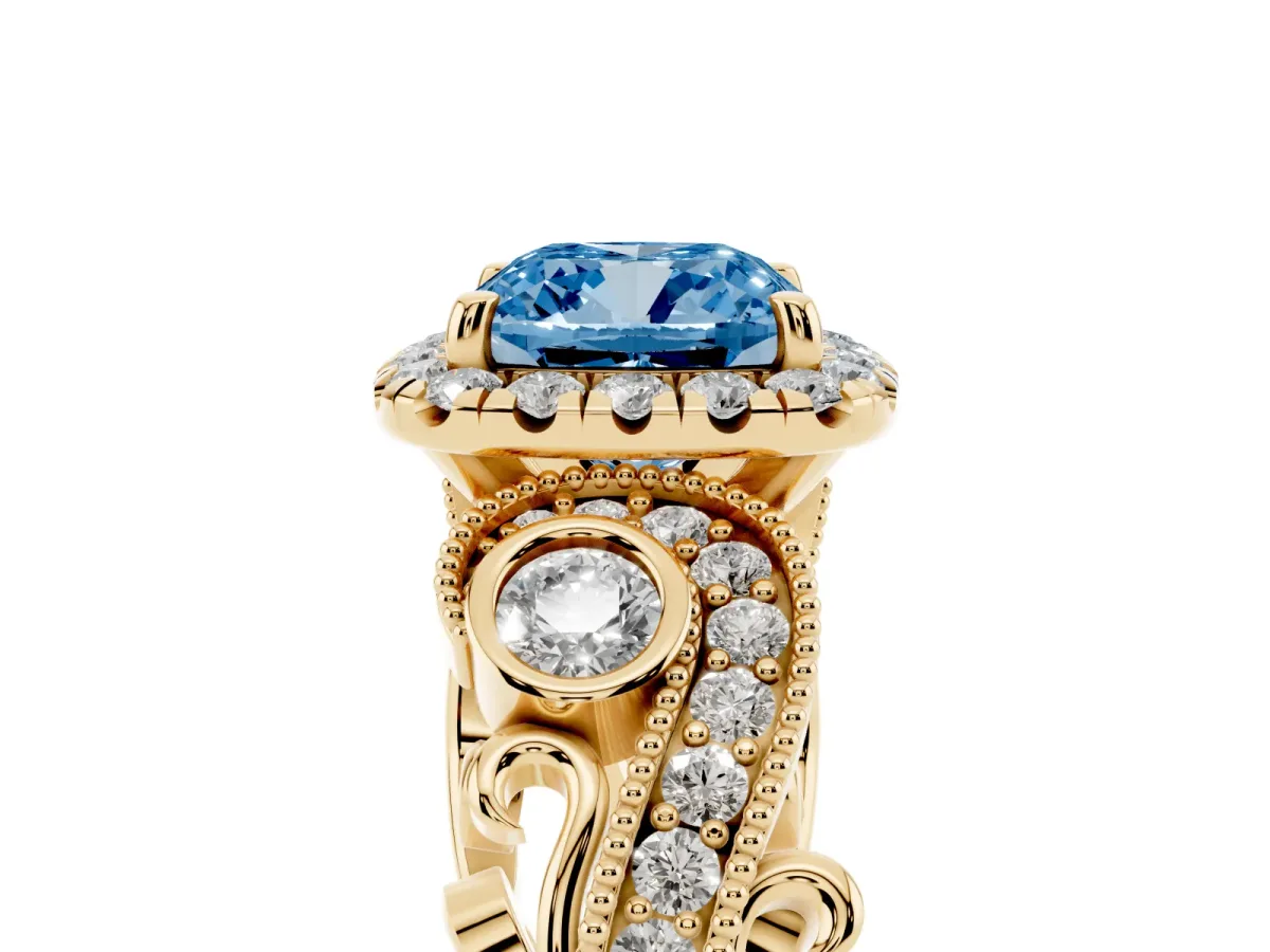 Fancy Blue Cushion Cut Halo Diamond Ring with Milgrain and Bezel Accents on a Split Shank Band Yellow gold