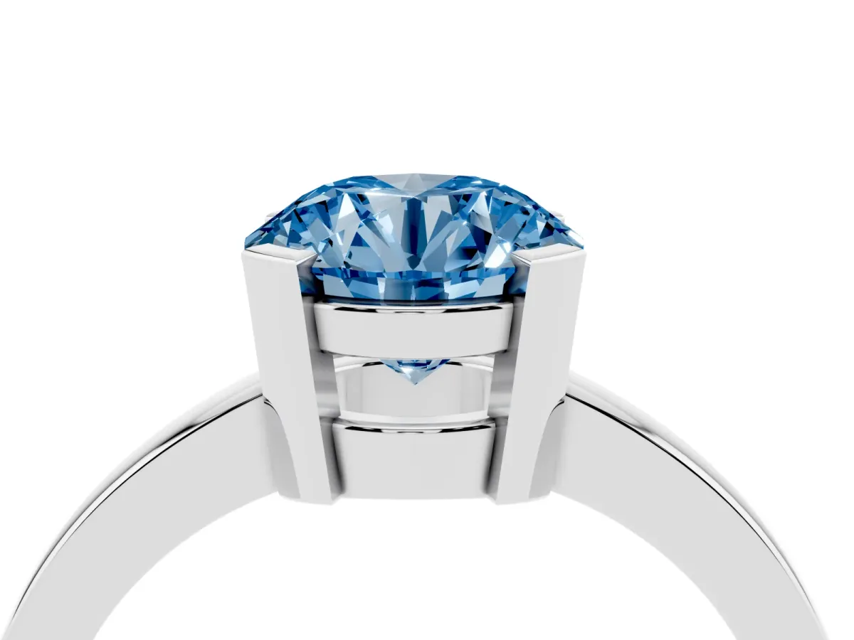 Fancy Blue Round Cut Cut Solitaire Ring with Four-Prong Setting and Classic Band Silver