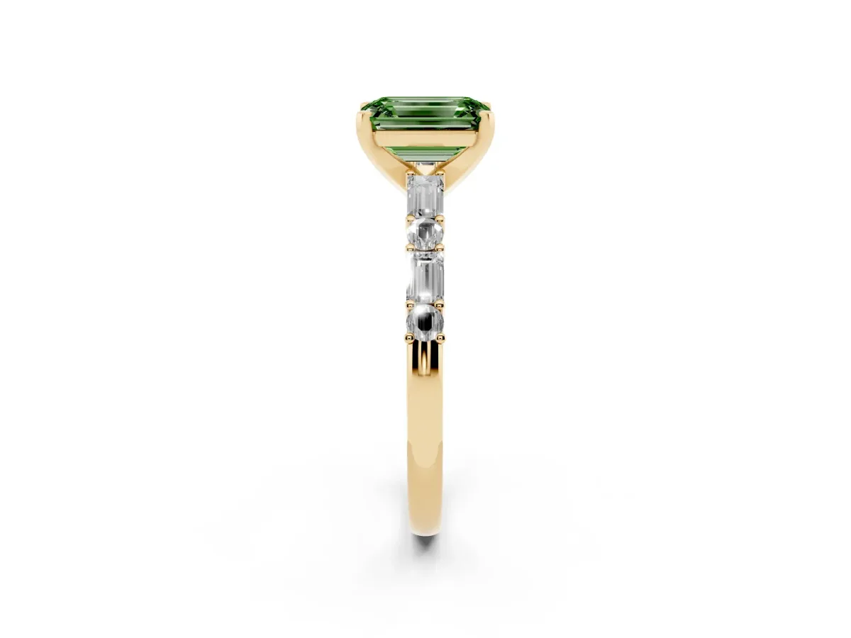 Fancy Green Emerald Cut Diamond Solitaire with Side Baguettes and Channel Set Band Yellow gold