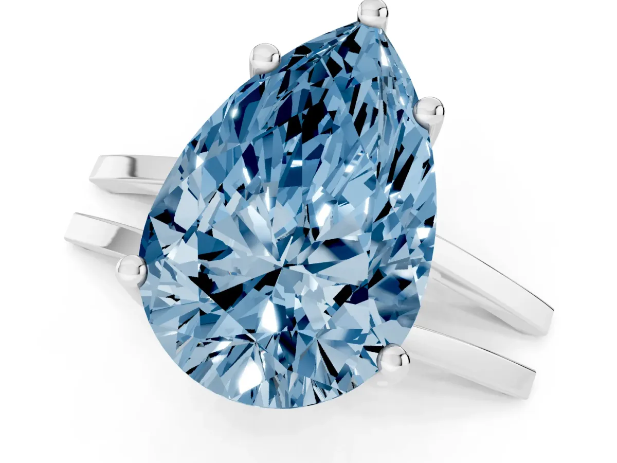 Fancy Blue Pear Cut Cut Diamond Solitaire Engagement Ring with Tapered Plain Band and Four-Prong Setting Silver