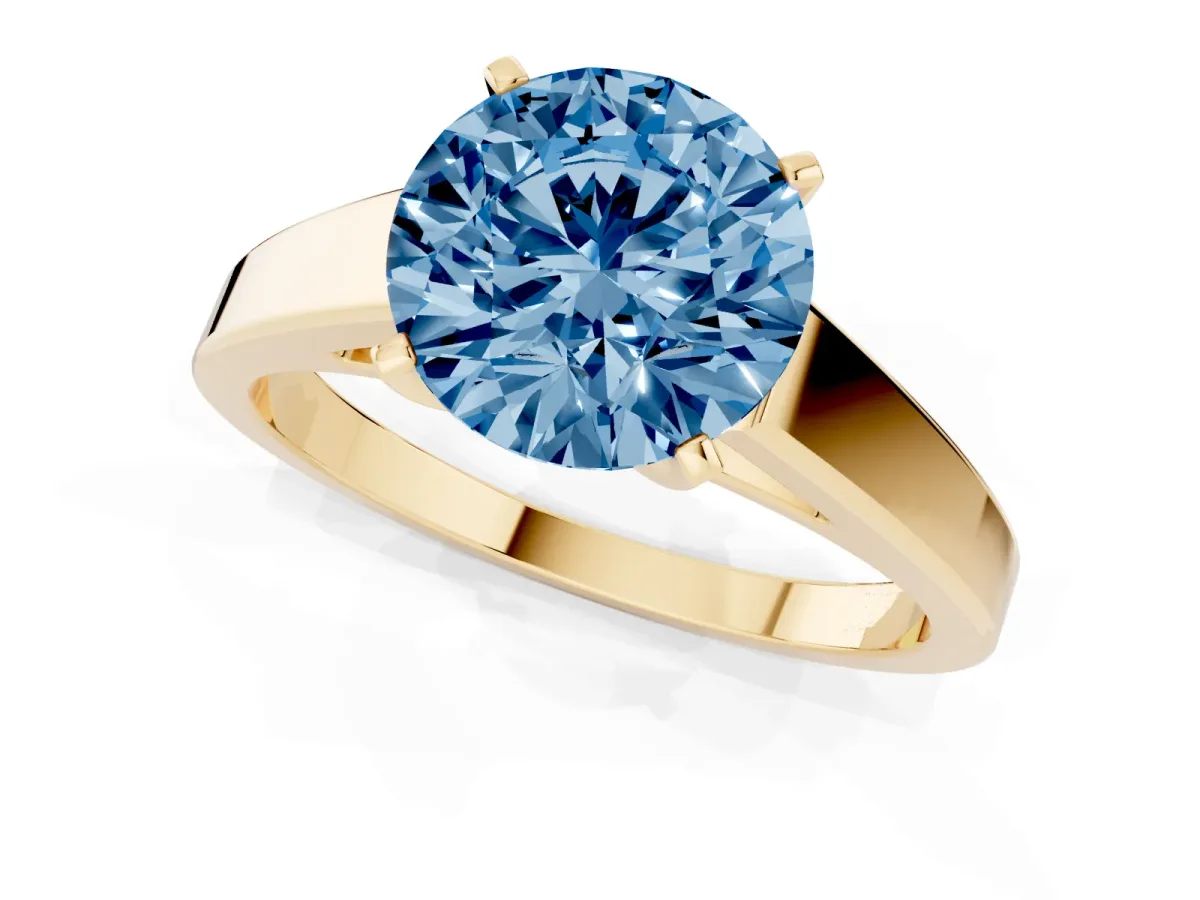 Fancy Blue Round Cut Solitaire Engagement Ring with Four-Prong Setting and Tapered Band Yellow gold