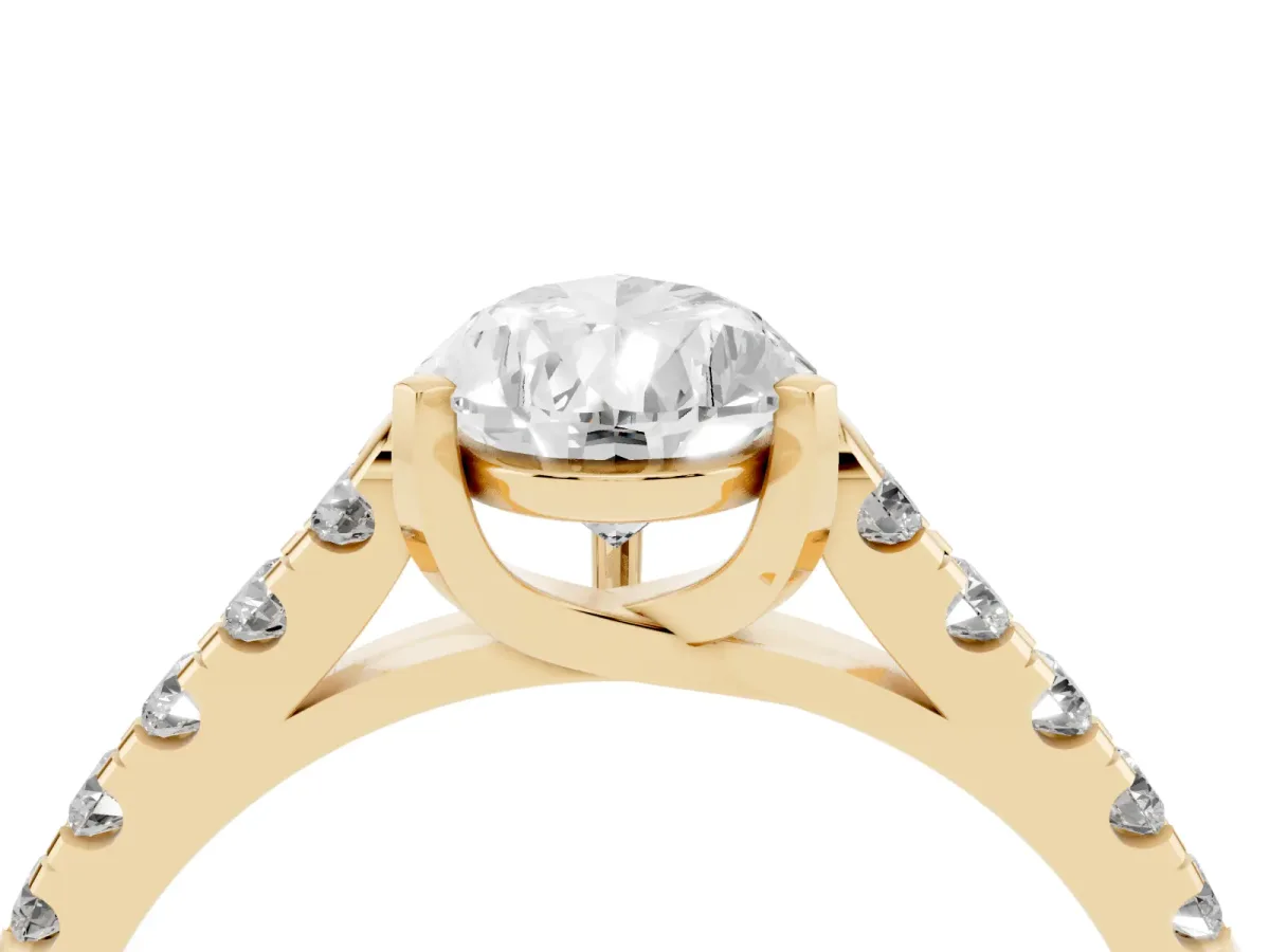 Pear Cut Diamond Pavé Band Solitaire Ring with Prong Setting Yellow gold