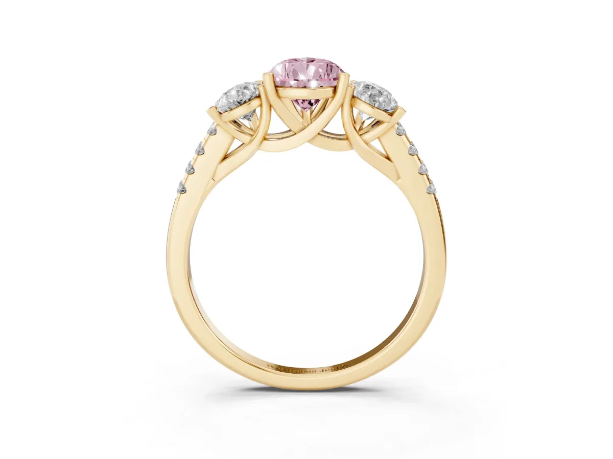 Fancy Pink Three-Stone Pear Cut Diamond Ring with Round Pavé Band and Prong Setting Yellow gold