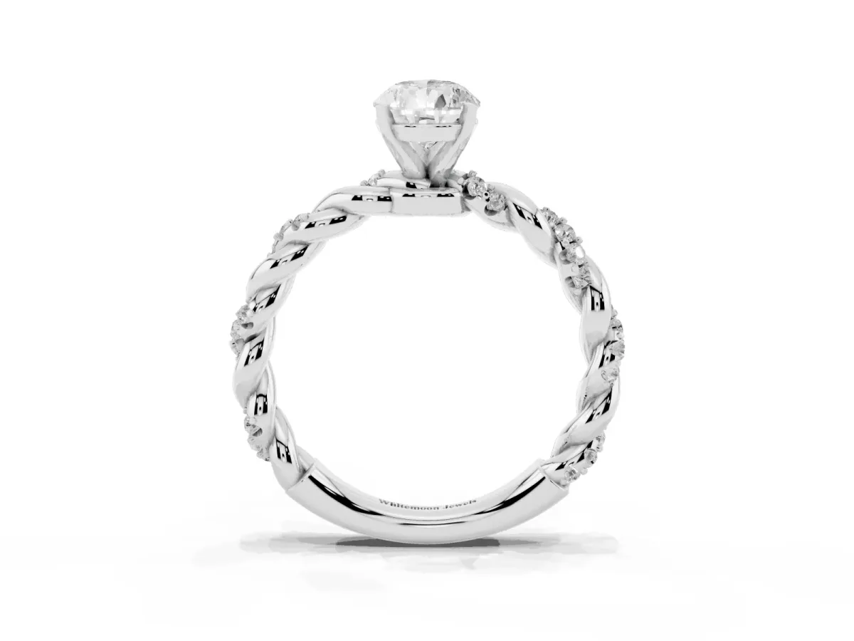 Pear Cut Diamond Solitaire Ring with Twisted Band and Pavé Accents Silver