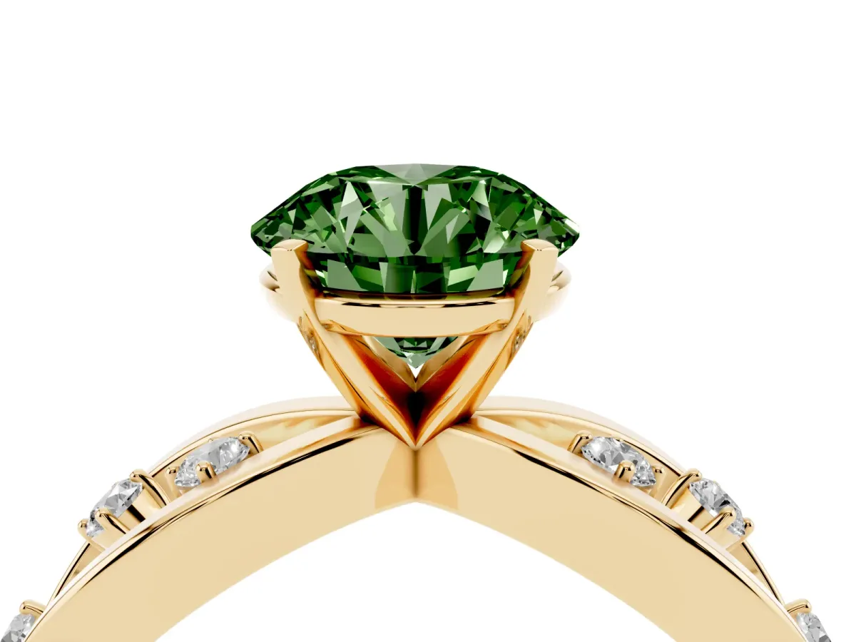 Fancy Green Round Cut Cut Solitaire Diamond with Side Stones on Criss-Cross Band and Four-Prong Setting Yellow gold