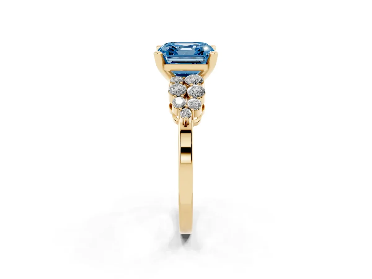 Fancy Blue Asscher Cut Cluster Diamond Engagement Ring with Pavé Band and Four-Prong Setting Yellow gold