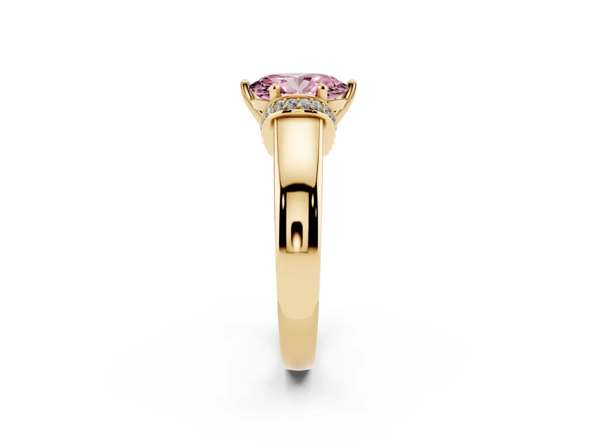 Fancy Pink Oval Cut Solitaire Diamond Ring with Pave Band and Six-Prong Setting Yellow gold
