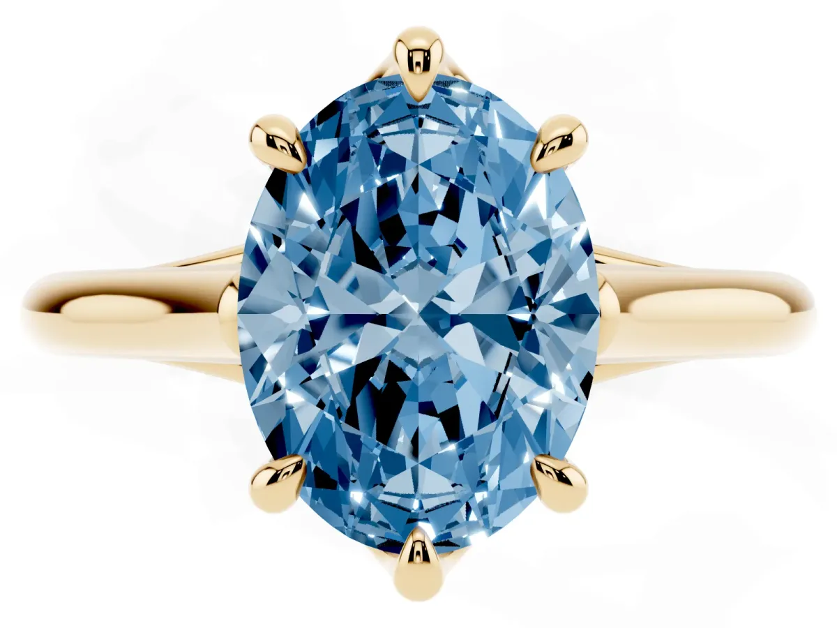 Fancy Blue Oval Cut Solitaire Engagement Ring with Six-Prong Setting and Classic Band Yellow gold