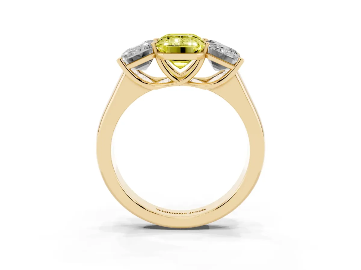 Fancy Yellow Emerald Cut Three-Stone Diamond Ring with Prong Setting on a Classic Band Yellow gold