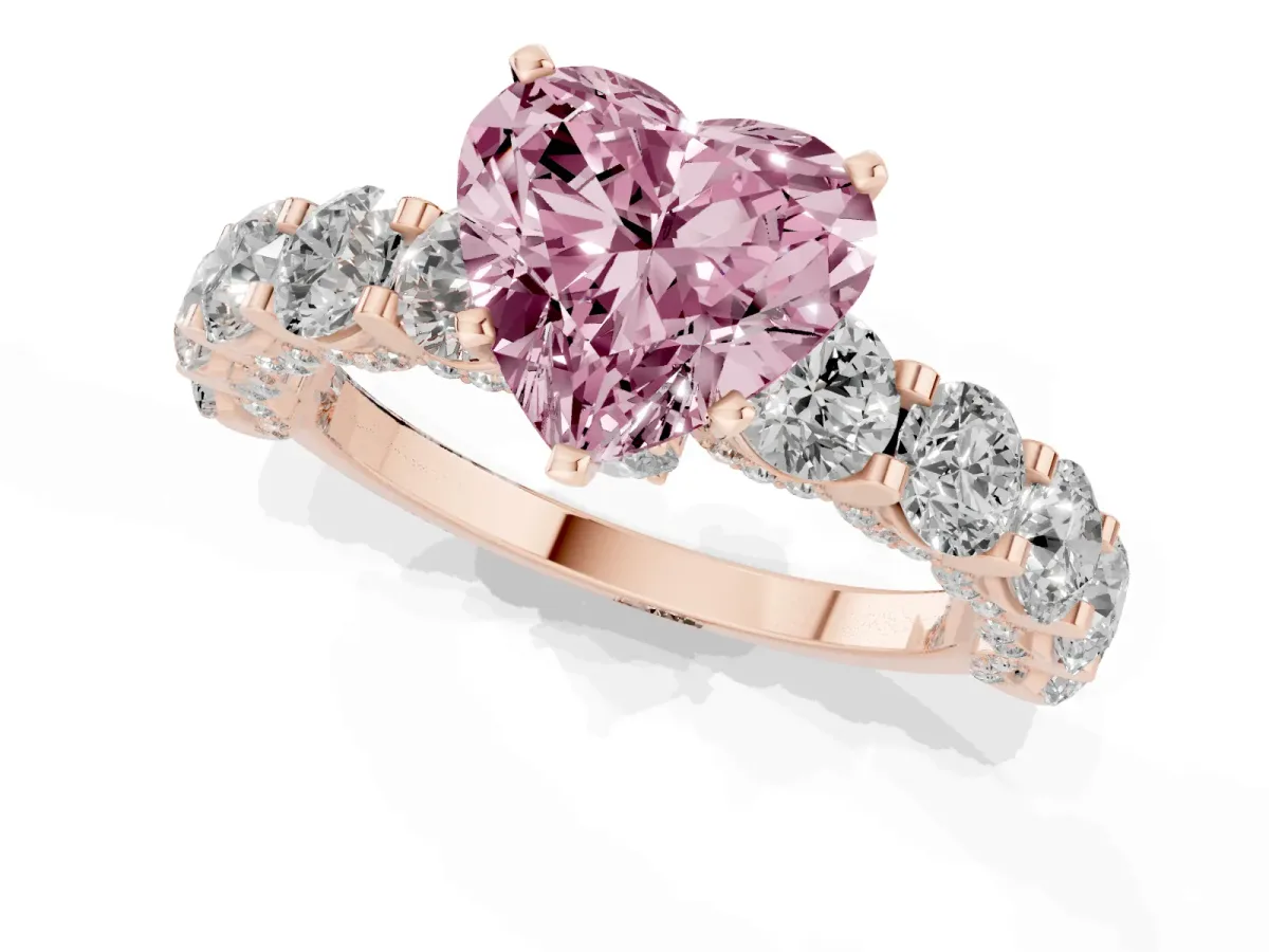 Fancy Pink Heart Cut Diamond Side Stone Engagement Ring with Four-Prong Setting Rose gold