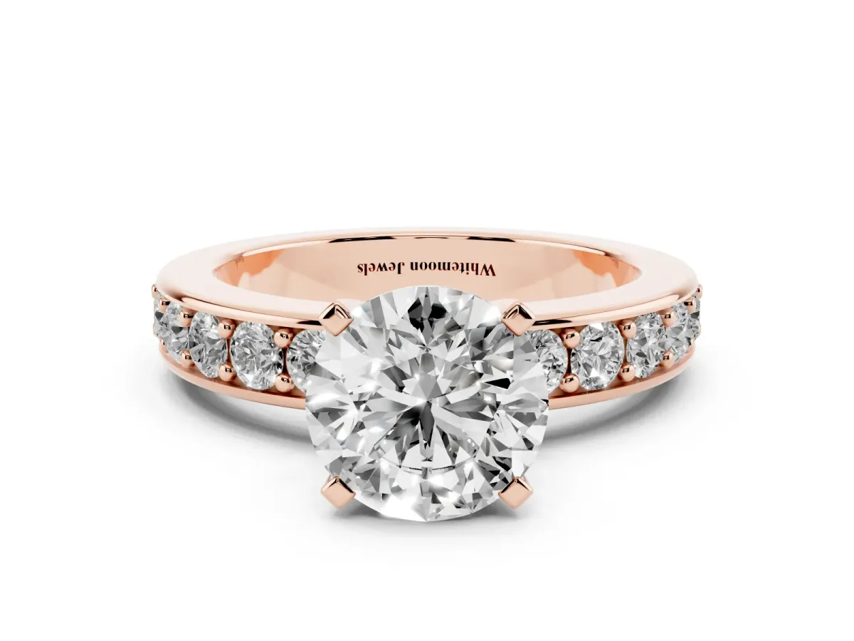 Round Cut Diamond Engagement Ring with Channel Set Round Band and Prong Setting Rose gold