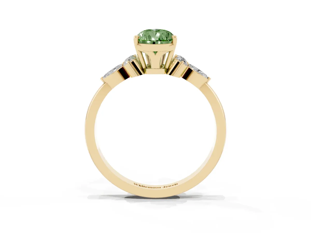 Fancy Green Pear Cut Brilliant Diamond Solitaire Ring with Pear Side Stones and Four-Prong Setting Yellow gold
