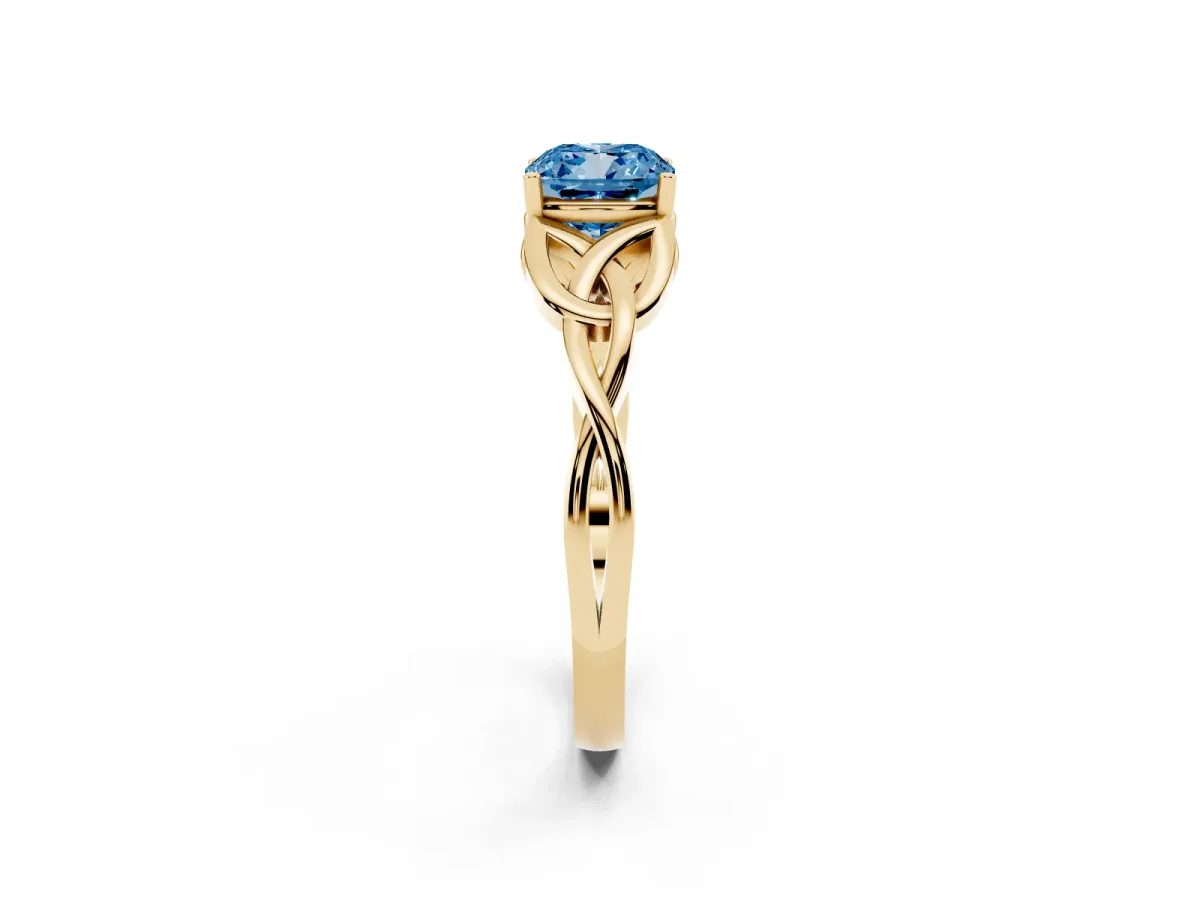 Fancy Blue Cushion Cut Diamond Solitaire Engagement Ring with Celtic Knot Band and Four-Prong Setting Yellow gold