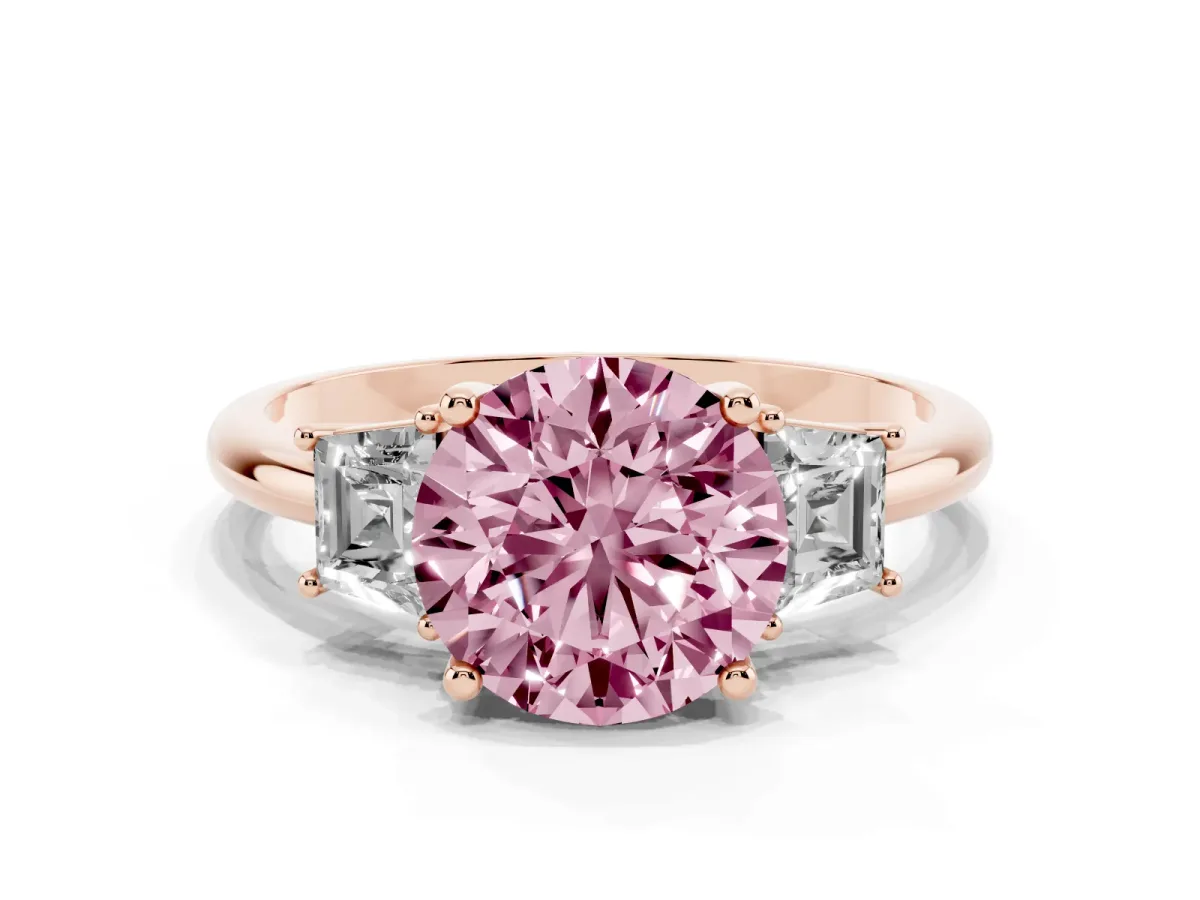 Fancy Pink Round Cut Diamond Three-Stone Ring with Trapezoid Side Stones and Prong Setting Rose gold