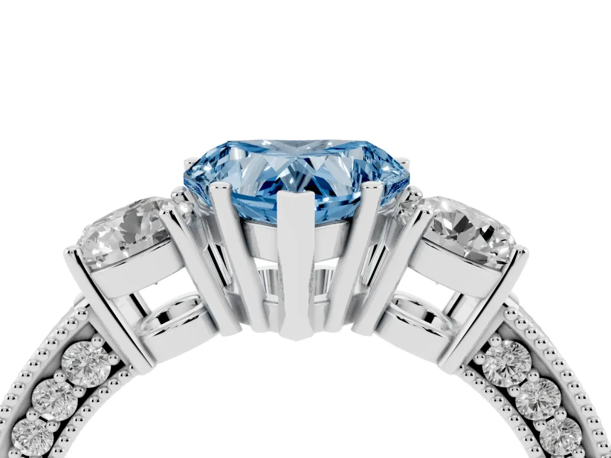 Fancy Blue Heart Cut Three-Stone Diamond Ring with Pavé Band and Four-Prong Setting Silver