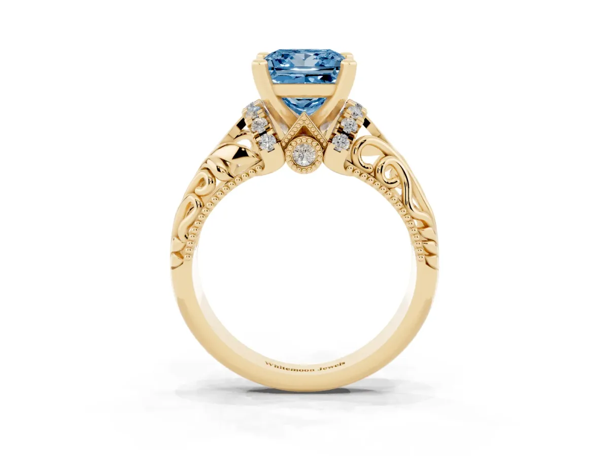 Fancy Blue Princess Cut Solitaire Filigree Engagement Ring with Halo and Prong Setting Yellow gold